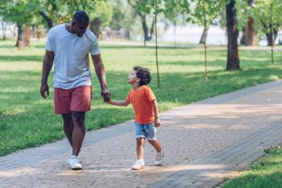 A father and son walking